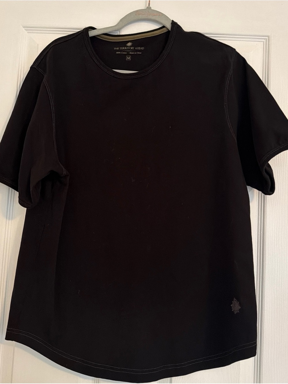The Territory Ahead Black Crewneck Tee with Olive Trim